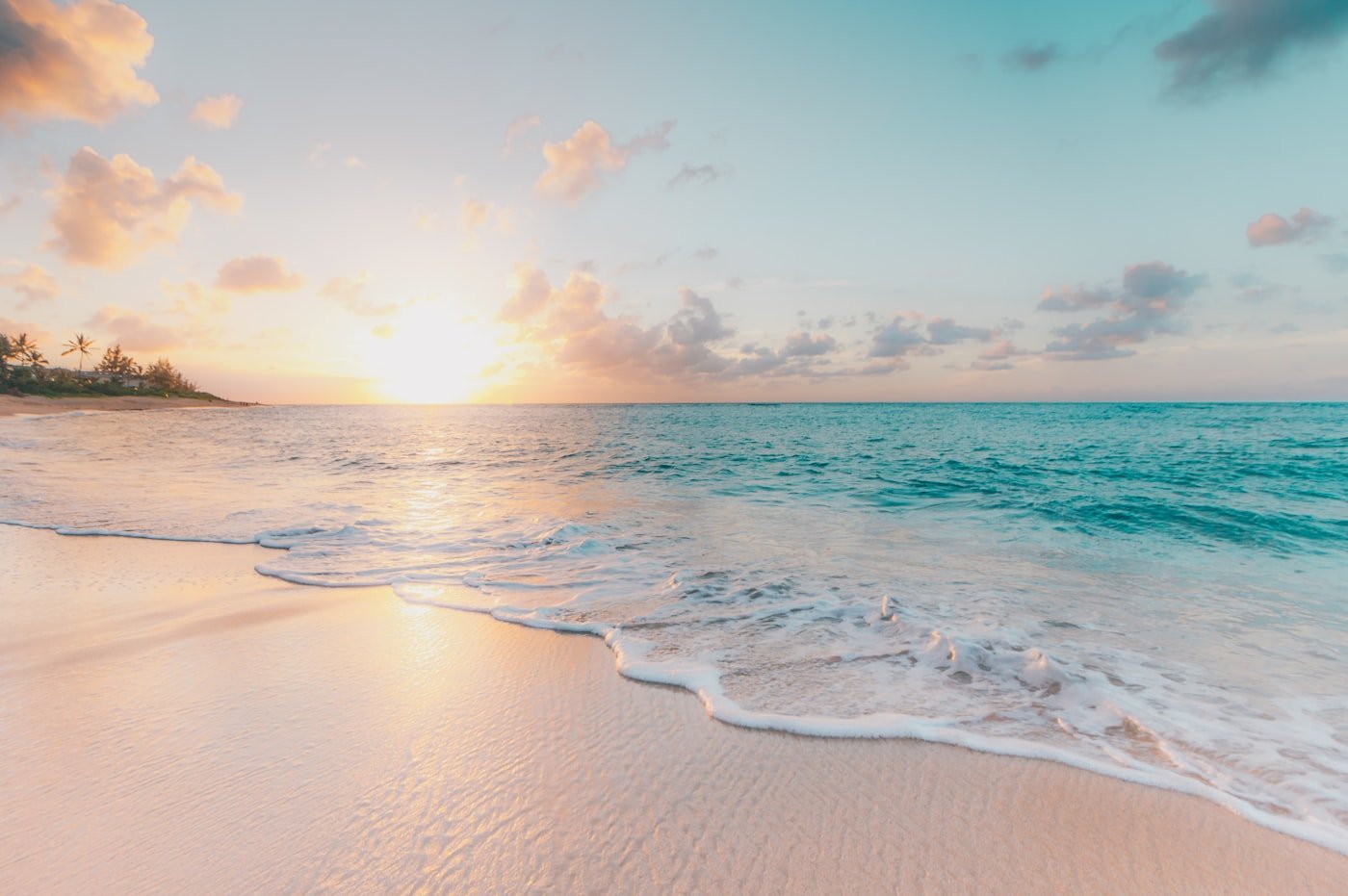 Soft waves washing onto a sunlit Red Sea shoreline