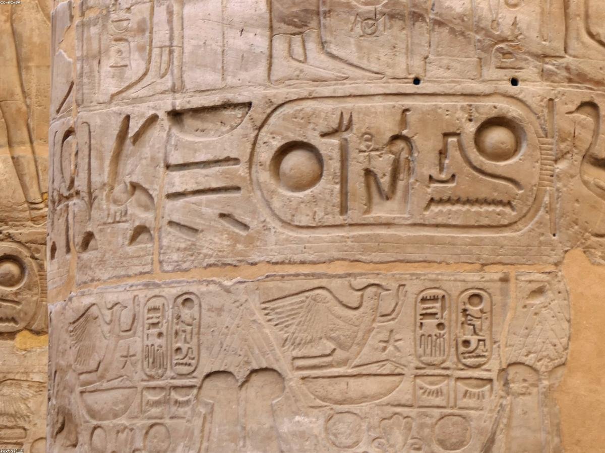 Hieroglyphs carved into a great column at Karnak temple, Luxor